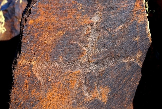 The Person on a horse. Petroglyphs the Bayan-Zhurek.