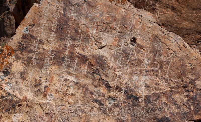 Buddhist inscriptions in valley Tamgaly-tas on river Ili.