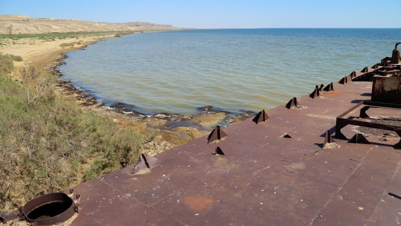 The barge is on Aral Sea and environs in the gulf Butakov.