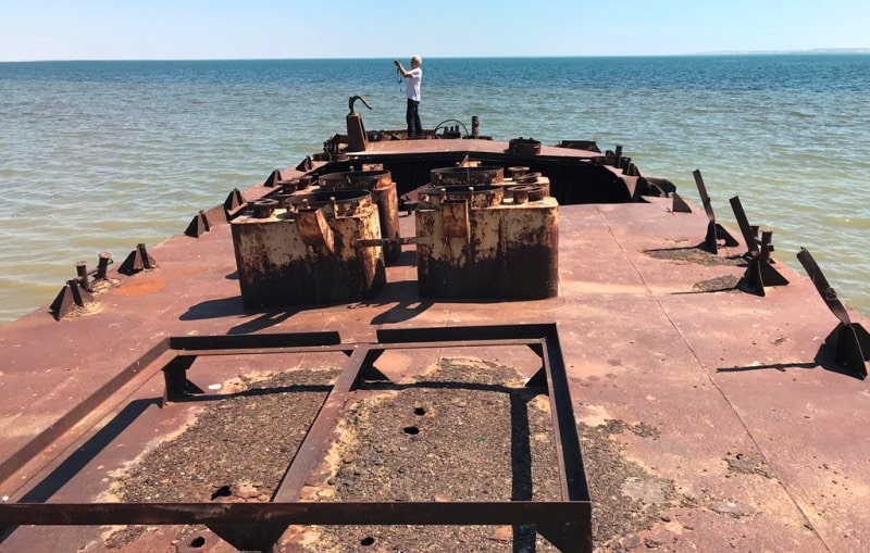 The barge is on Aral Sea and environs in the gulf Butakov.