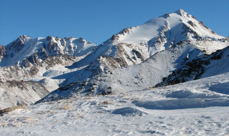 Peak Lokomotiv at the left. On the right peak of Sovetov in the Big Almaty gorge.