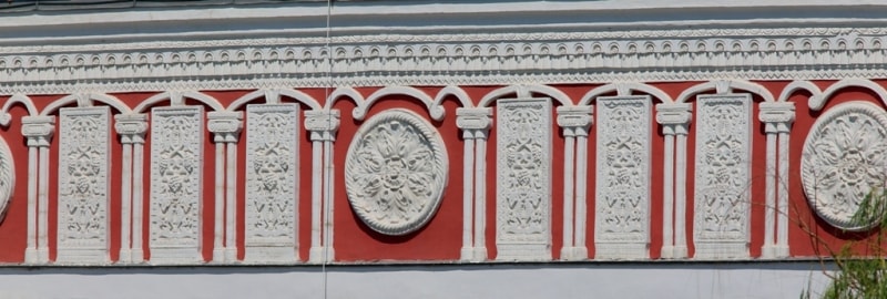 Frescos on a facade of a building of a market.