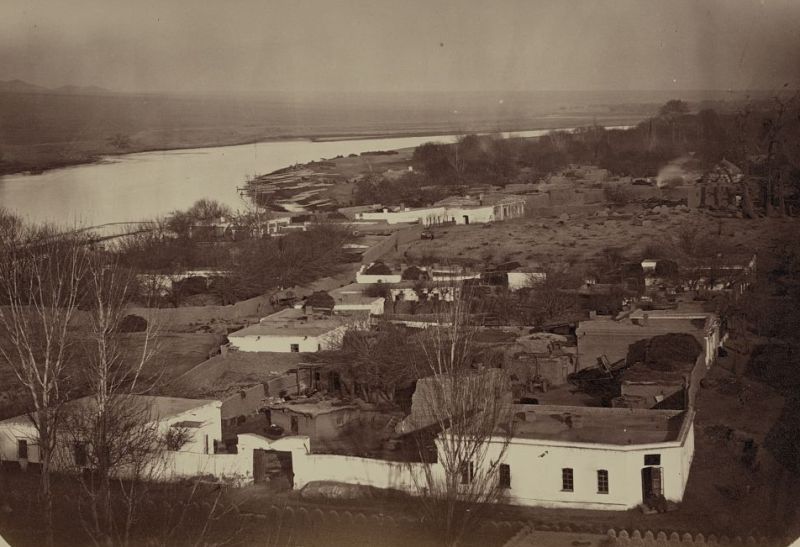 City of Khudjand. A kind from air on a part of city the Tomb Khadji-Baba, on a background is visible the river Cyr-Darya.