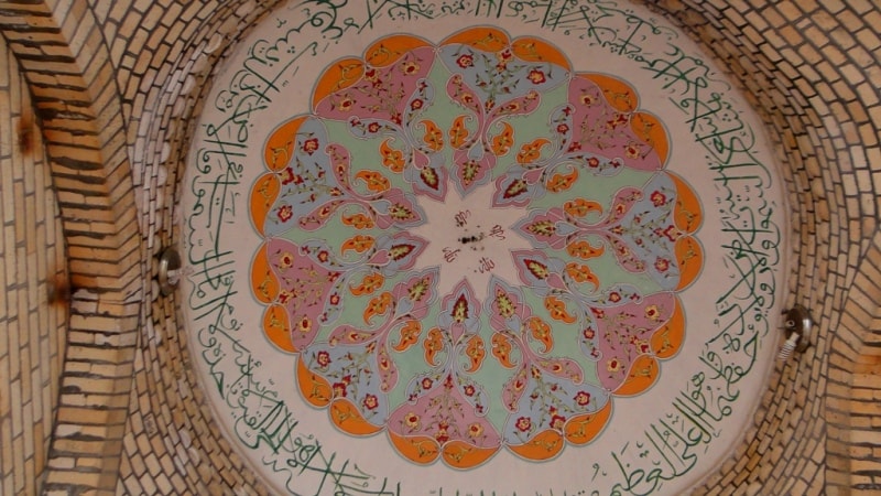 Painted ceiling of a dome in Makhdumi Azam the mausoleum.