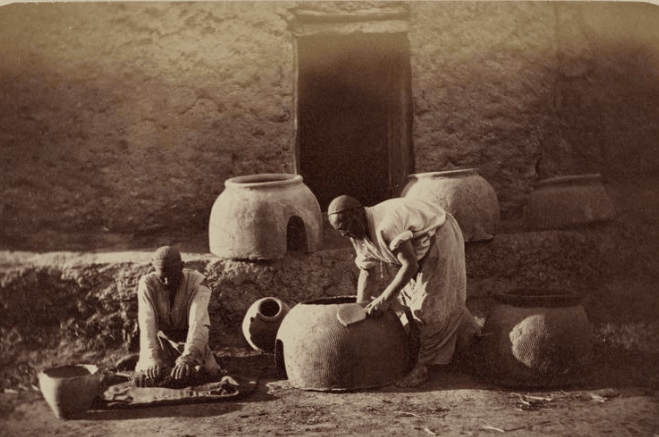Potter's manufacture. Manufacture of a pottery for a batch of bread. Photos from the Turkestan album. (1871 – 1872).