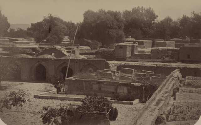 Sheibani-Khan madrasah and the ruins of the Kuskunchi Khan mausoleum. View of the courtyard and the tomb of Sheibani Khan. Photo from Turkestan album.