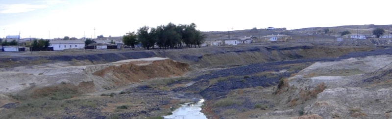 Karsakpay metallurgical plant and Karsakpay village.