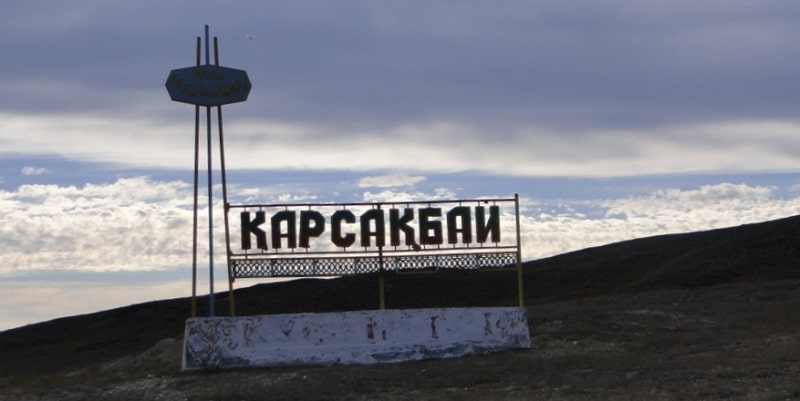 Karsakpay metallurgical plant and Karsakpay village.