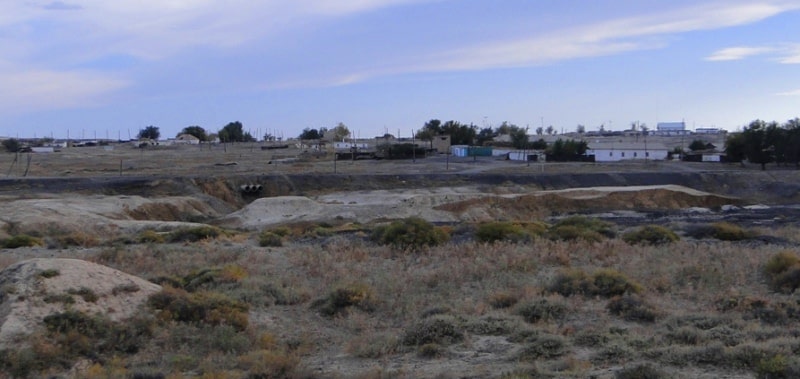 Karsakpay metallurgical plant and Karsakpay village.