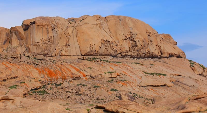 Triangular stone "Kyz Aulie" (Holy Virgin), a place of worship for holy spirits near Aulie Tas cave.