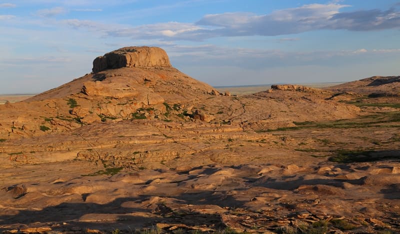 Bektau Ata Mountains, like a separate rocky country in middle of the steppe, range in altitude from 600 to 1,214 meters above sea level.