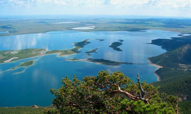 Lake Burabay, located in Burabay National Nature Park in Borovsky District of Akmola Region. It is one of most picturesque places in country, known for its crystal-clear lakes, pine forests, and mountains.