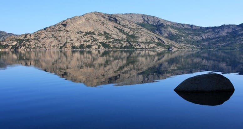The misty morning haze over the lake - a moment when nature breathes especially softly.
