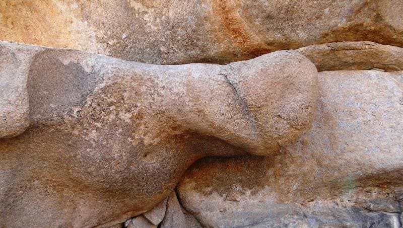 Triangular stone "Kyz Aulie" (Holy Virgin), a place of worship for holy spirits near Aulie Tas cave.