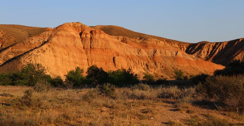 Kendyrly-Sai – a mosaic of time and wind. Layers of ancient rocks reveal pages of geological record of Ili Basin.