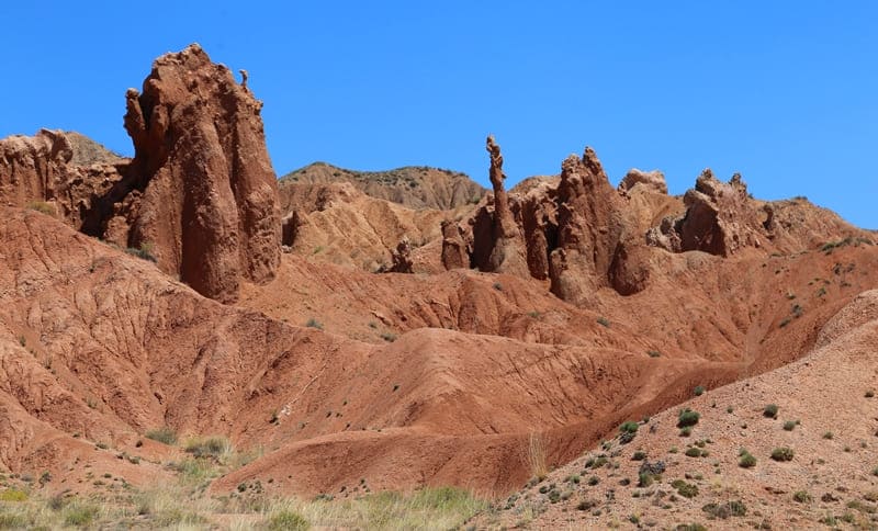 Colorful walls of canyon. As if with an artist's brush, nature has painted slopes with ochre, clay, and ash of time.