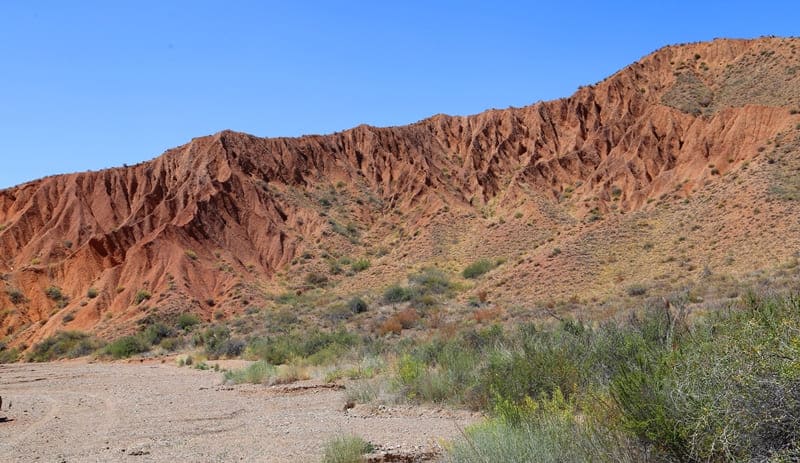 Colors of a geological kaleidoscope. From pale gold to blood red – hues of rock change with every ray of sunlight.