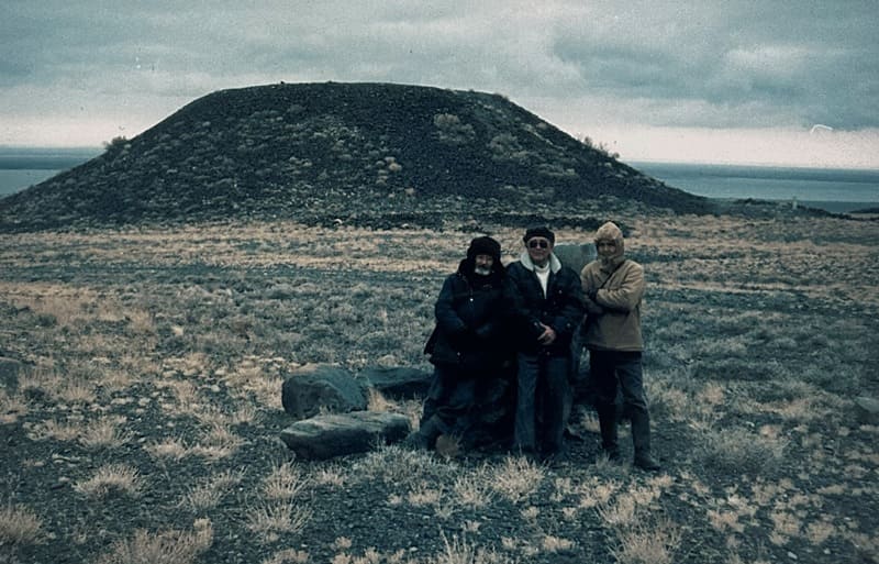K. Akishev with his colleagues in front of the Great Besshatyr Mound. Photograph from the Almaty Central Museum.