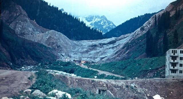 This photograph shows a building that was specially constructed to test the destructive power of an explosion. 1966.