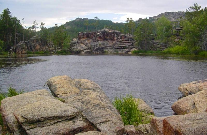 Granite cliffs frame Lake Shaitankol.