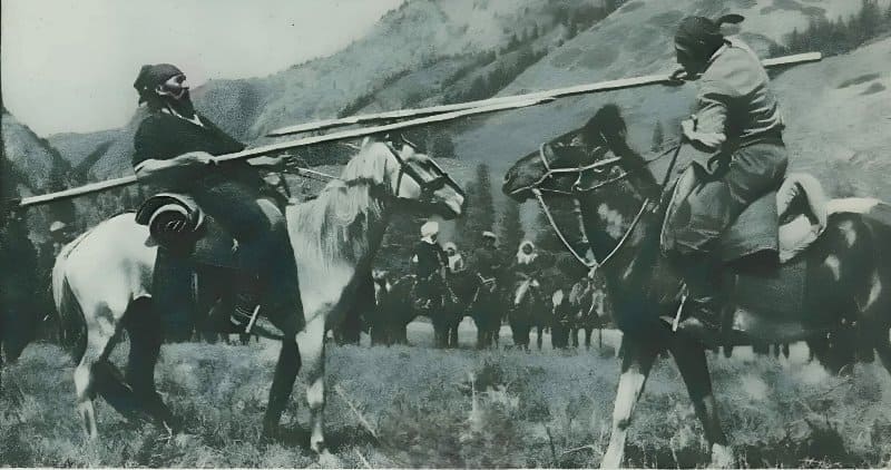 A traditional equestrian competition, er sayysh (a duel between riders on wooden pikes), during a folk festival in Kyrgyzstan, 1930s. Photographer: Max Alper. USSR in Construction Magazine, 1938. Er sayysh is an ancient national equestrian game of the Turkic peoples (specifically, the Kyrgyz and Kazakhs), in which two riders attempt to unseat each other using long poles with soft or wrapped tips. This photograph is part of a historical photo archive documenting the daily life and traditional sports competitions of Central Asian nomads during the Soviet period.