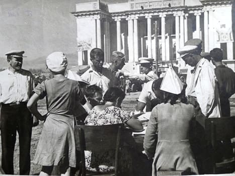 Stalinabad, September 6, 1947. Volunteers sign up for work related to the arrangement of the square near the Opera and Ballet Theatre.