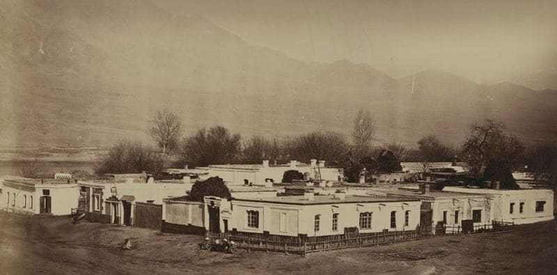 A small Russian village in the fortification of Chinaz, located in the Syr Darya region. Photograph from 1871 and is part of The ethnographic section of the "Turkestan Album."