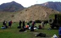 Preparation for the beginning trekking on tourist camp At-Djailoo.