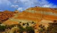 Multicolored chalk layers of “Tiger Mountains”, revealed by centuries of erosion.