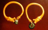 Female ear rings "The Dragon a biting tail" found on excavation of mausoleum Kerderi.